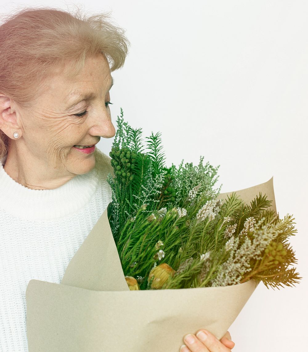 Senior Woman Hold Smell Flower Bouquet Studio Portrait