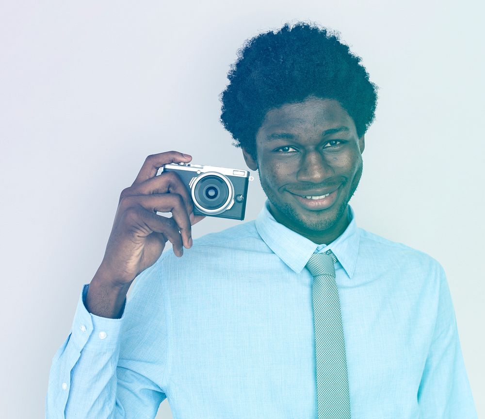African Man Hand Hold Snap Camera Studio Portrait