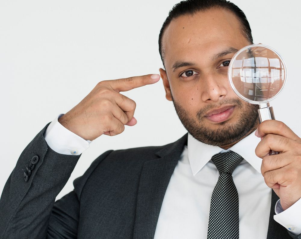 Indian Man Business Magnifying Glass Concept