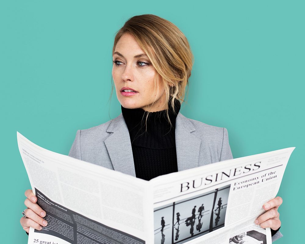 Caucasian Business Woman Reading Newspaper