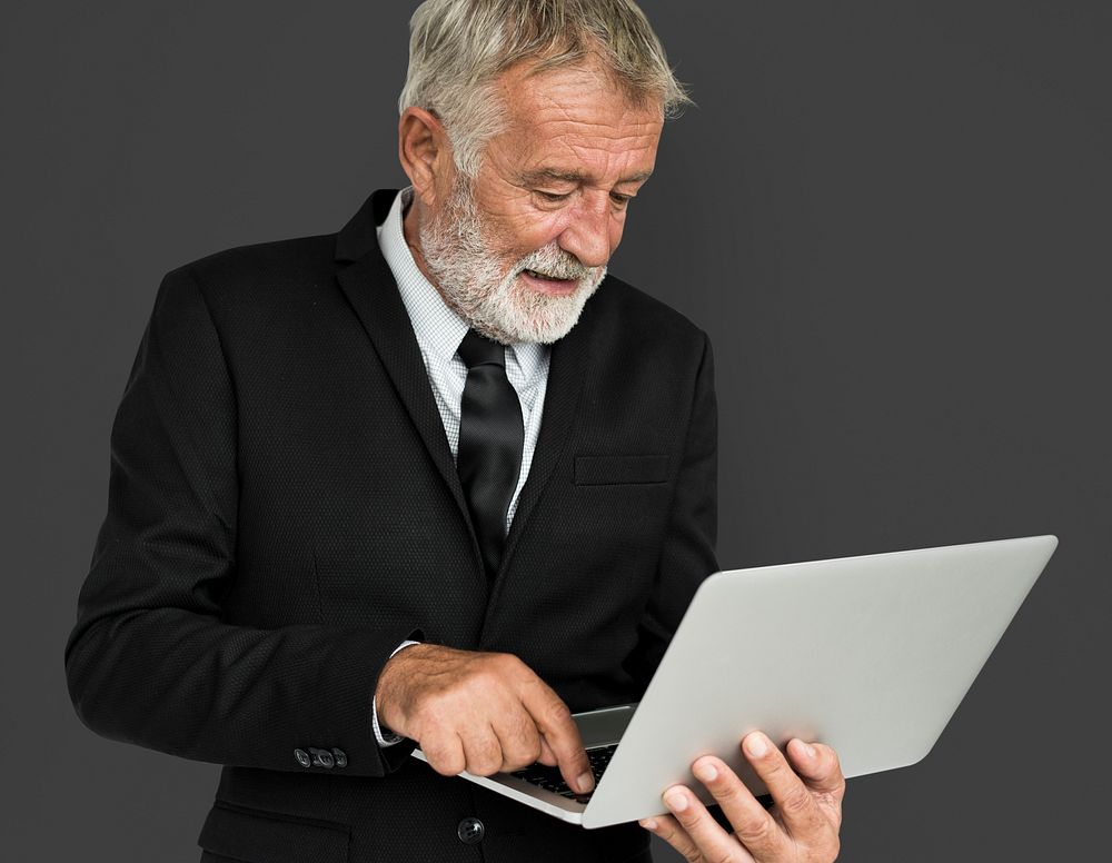 Caucasian Mature Business Man Laptop Concept