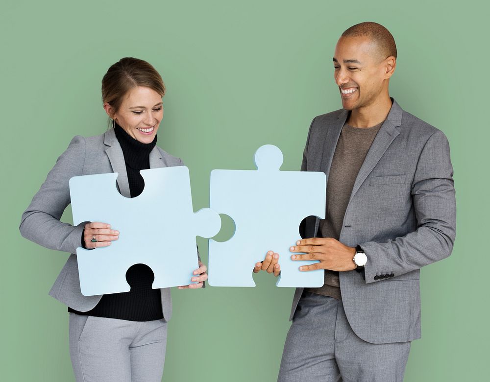 Business People Smiling Happiness Holding Jigsaw Puzzle Concept