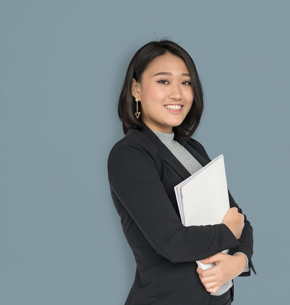 Asian Business Woman Holding Documents