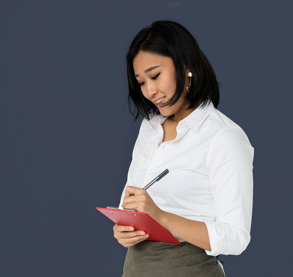 Asian Business Woman Writing Notes