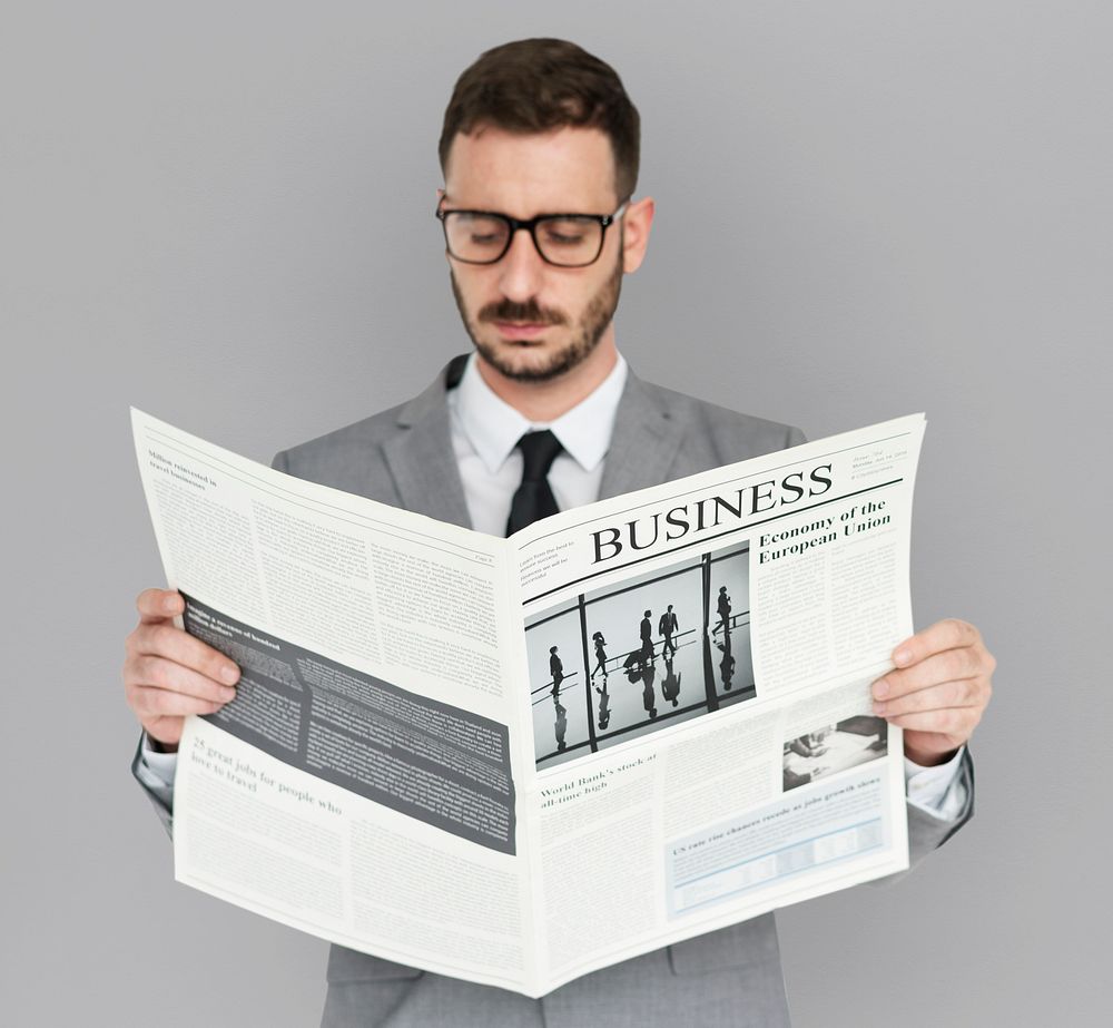 Caucasian Business Man Newspaper