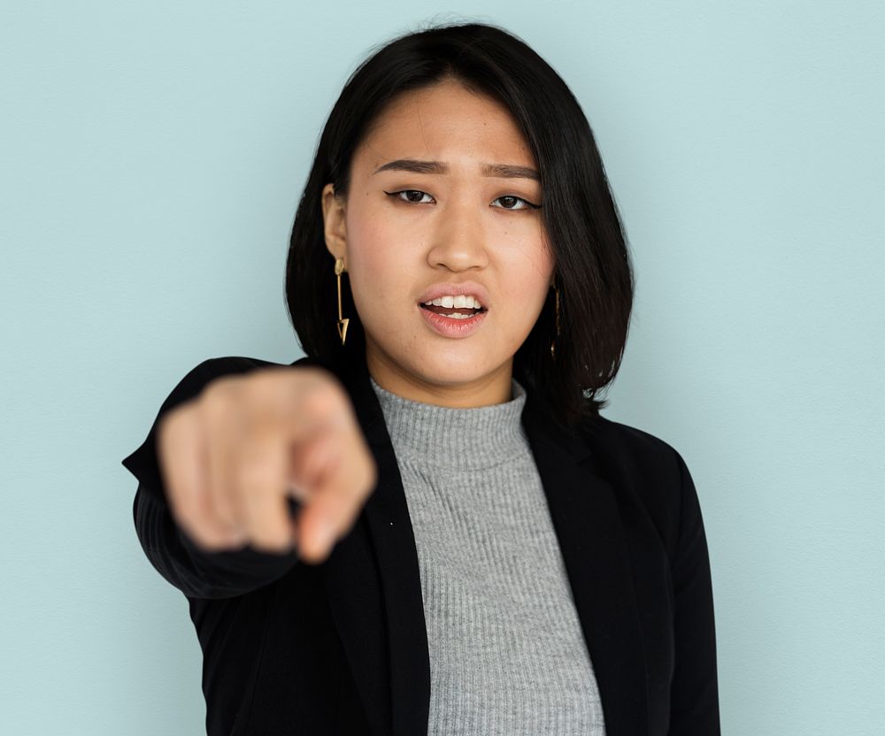 Young Asian Business Woman Pointing Angry