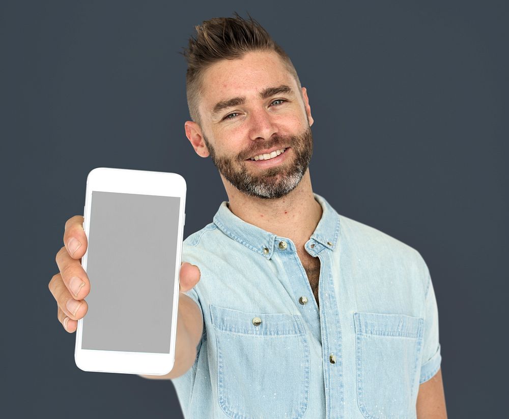 Caucasian Man Holding Phone Smiling