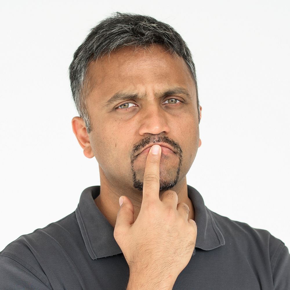 Adult man touching his face thoughtful gesture