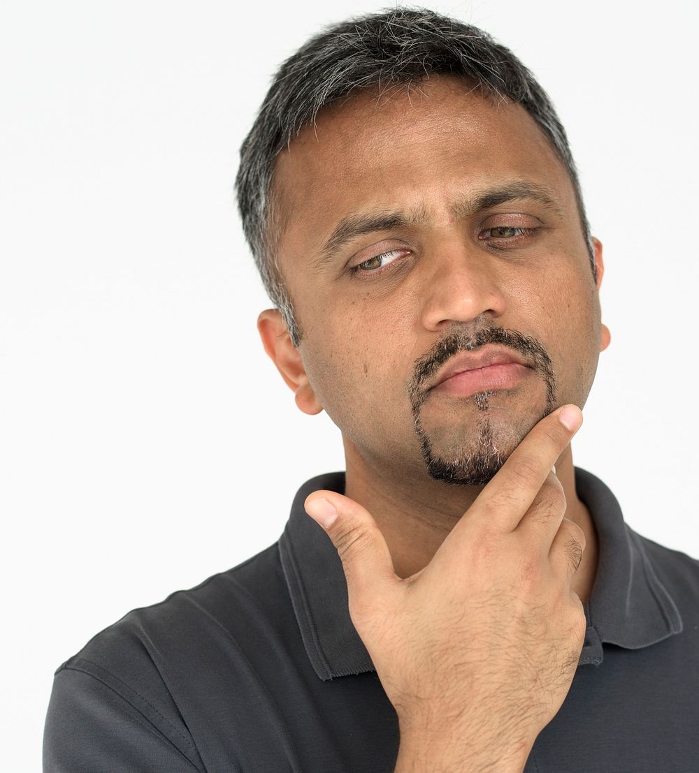 Adult man touching his face thoughtful gesture