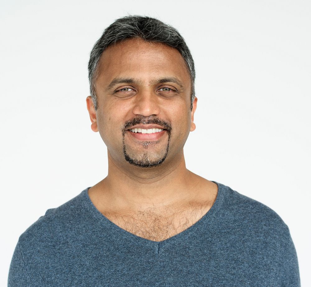 Indian guy smiling cheerful studio portrait