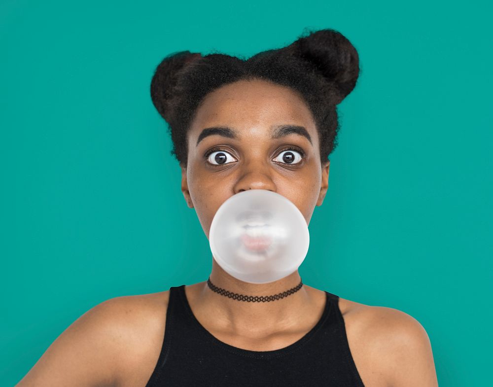 African Woman Blowing Bubble Gum Playful Portrait