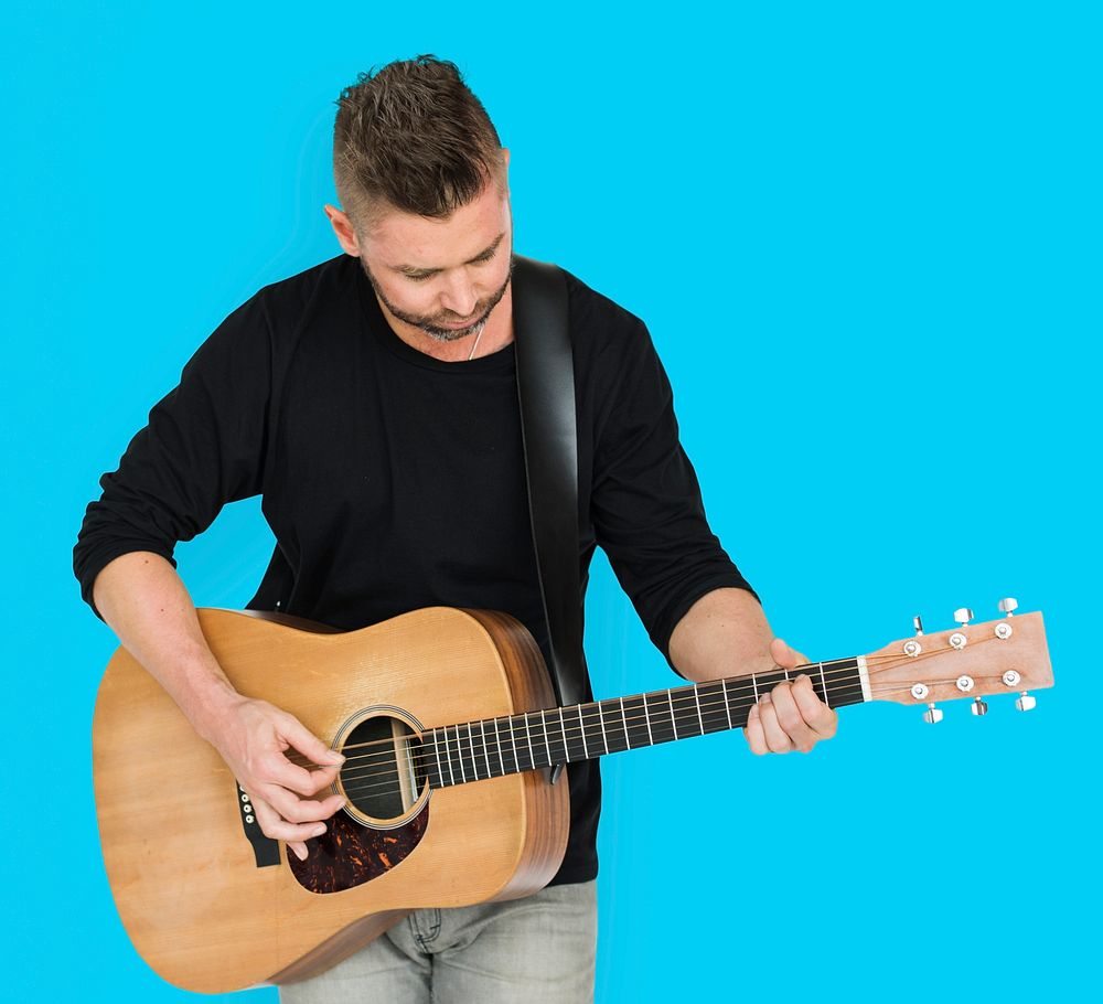 Caucasian Man Playing Guitar