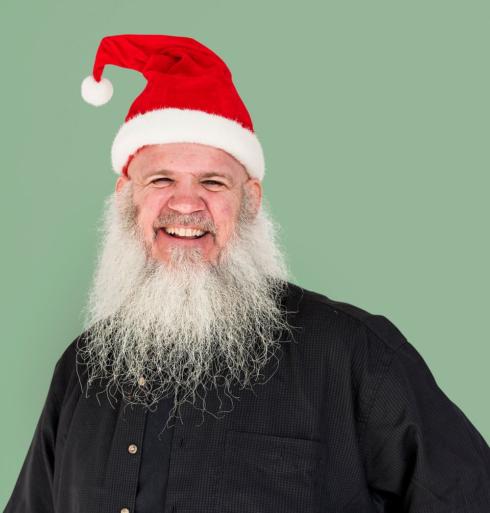 Portrait of a man wearing Santa hat