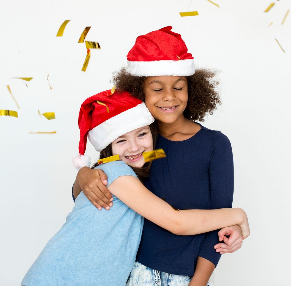 two girls celebrating a Christmas time 