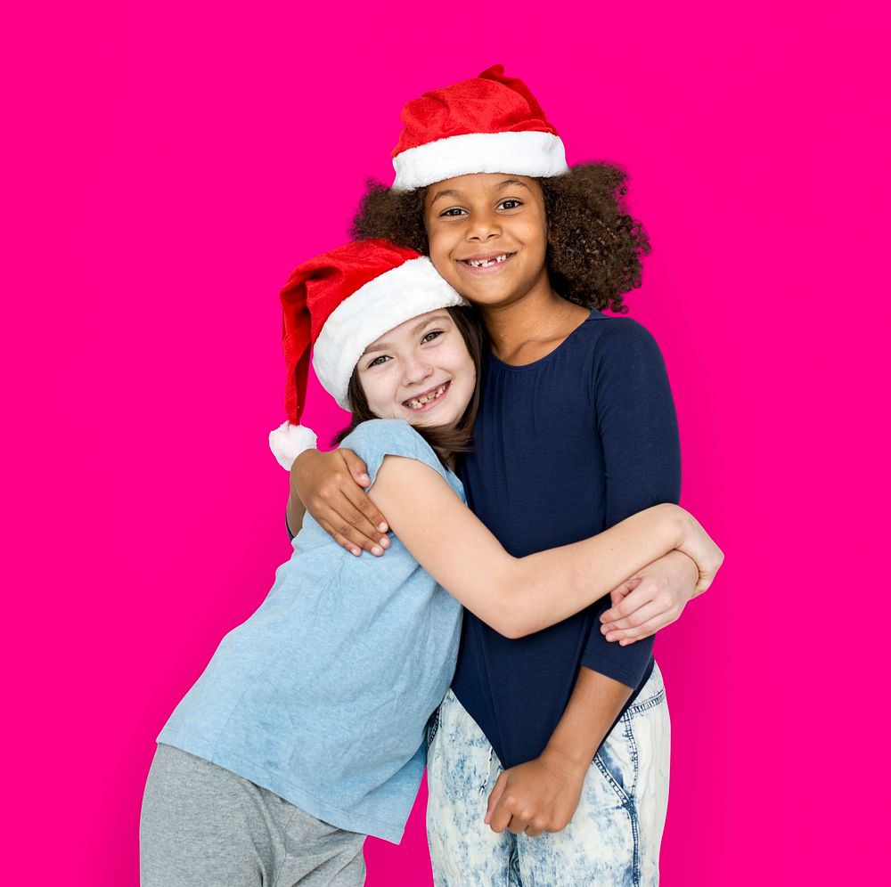 Little Girls Friends Hugging Christmas Hat