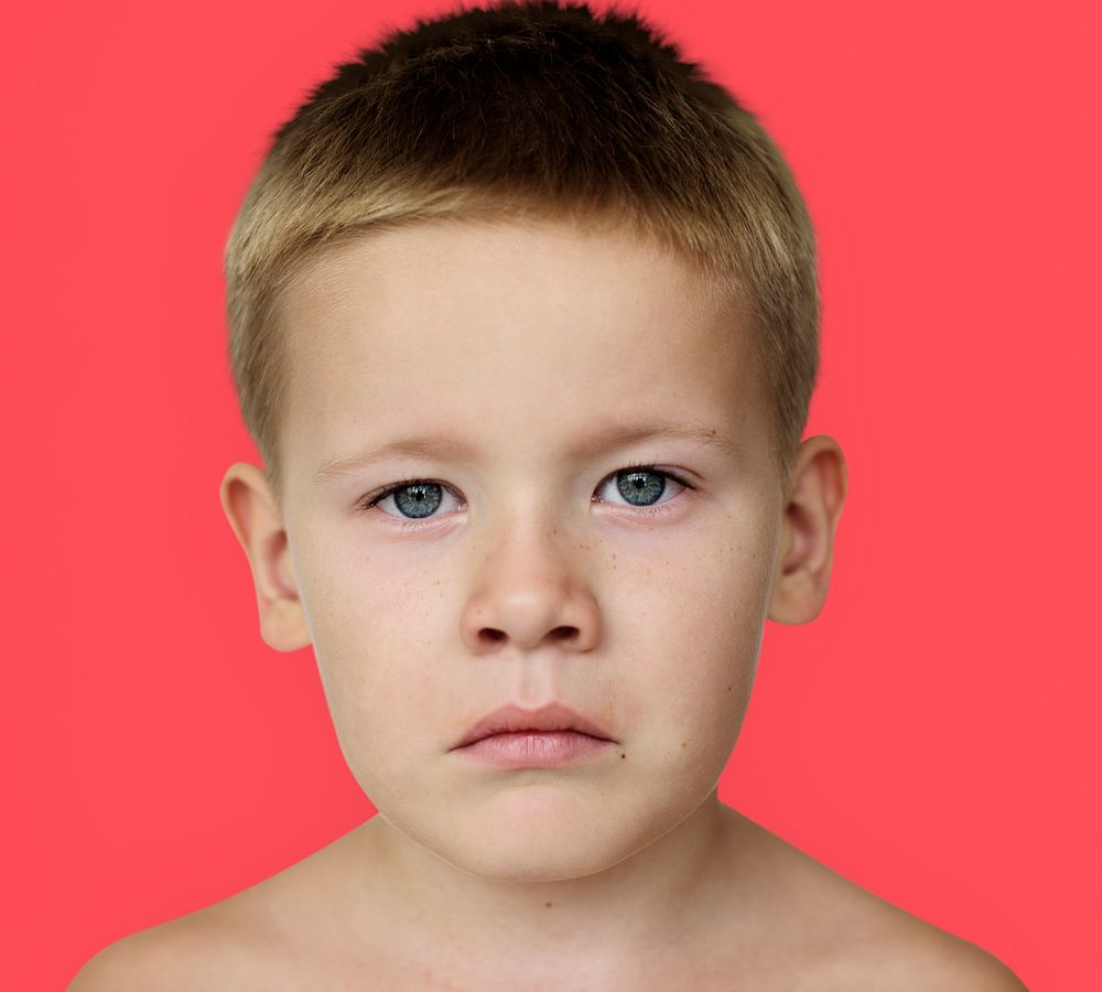 Caucasian Little Boy Frowning Bare Chested