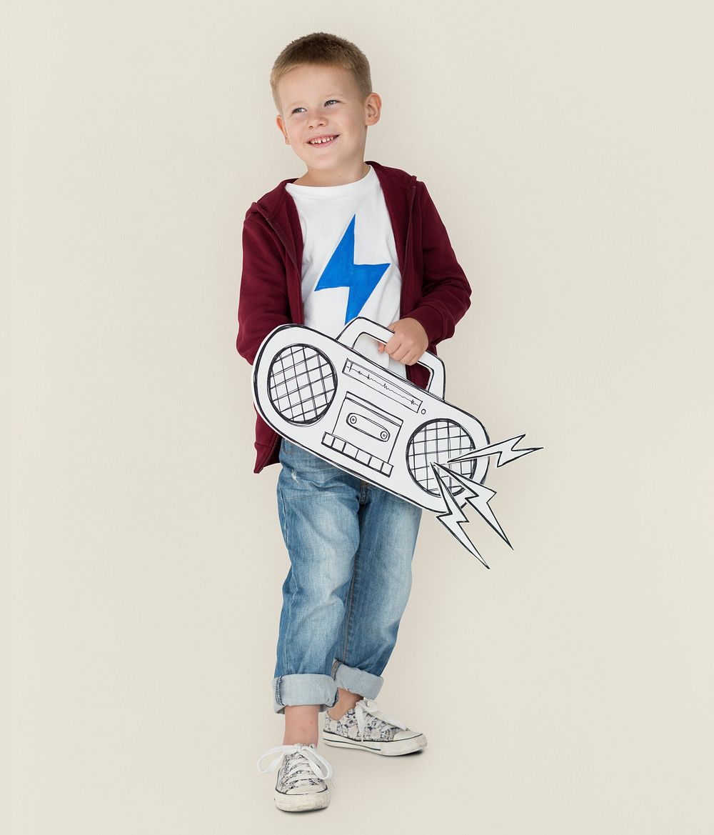 Portrait of a Little Blond Caucasian Boy with a Radio Isolated