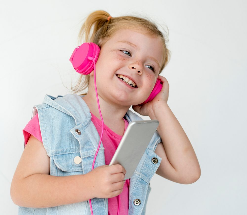Portrait of a young girl with headphones
