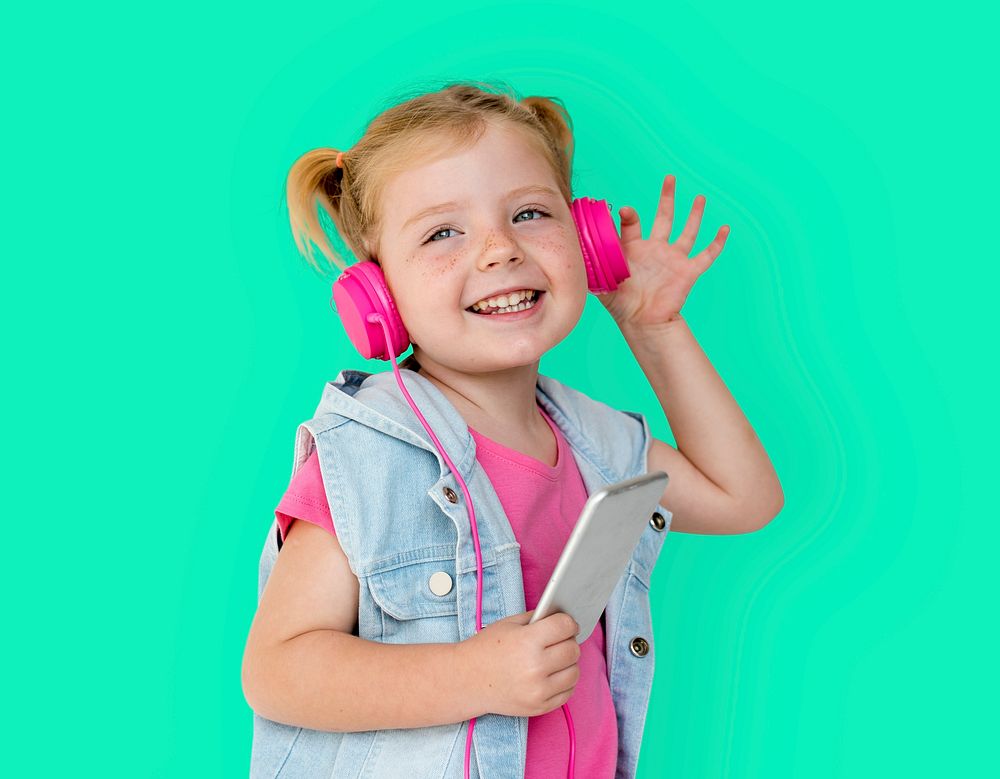 Little GIrl Smiling Happiness Music Headphones