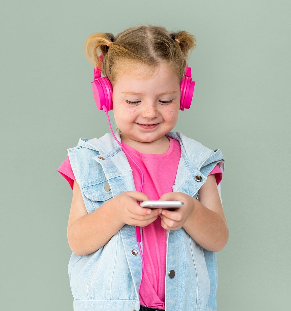 Little GIrl Smiling Happiness Music Headphones