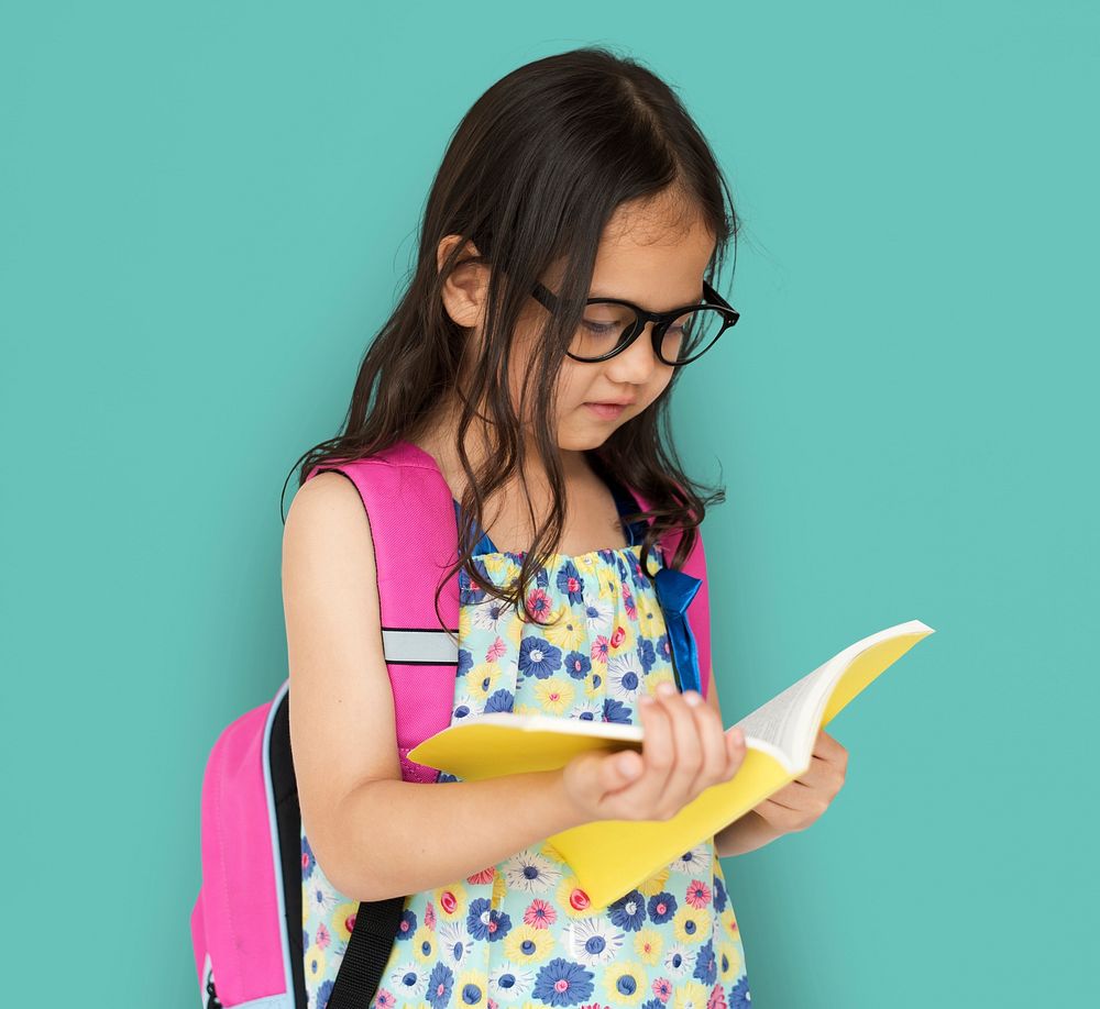 Little Girl Reading Book Focusing