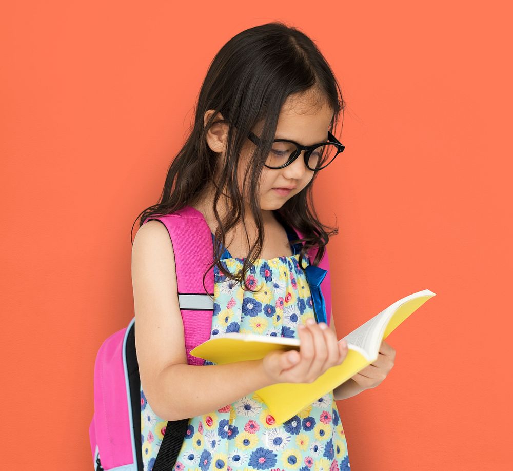 Little Girl Reading Book Focusing