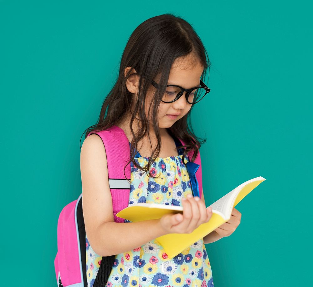 Little Girl Reading Book Focusing