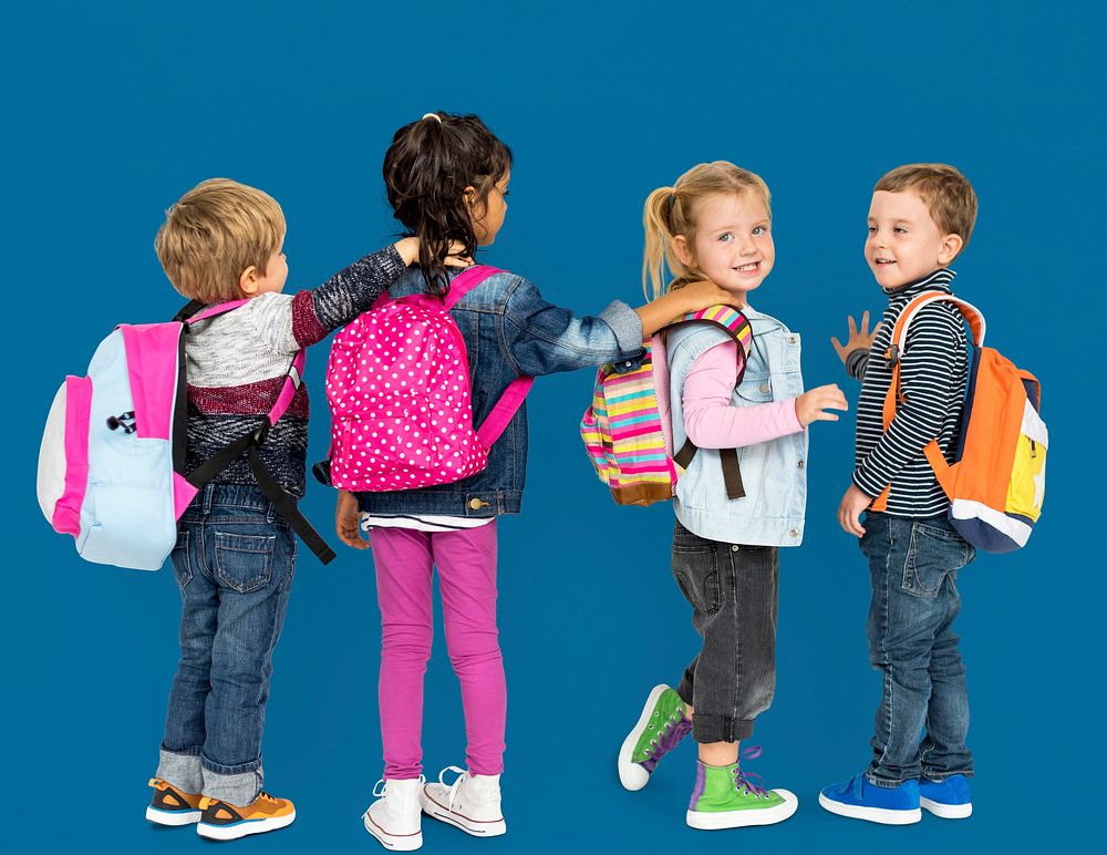 Little Children Carrying Backpack School