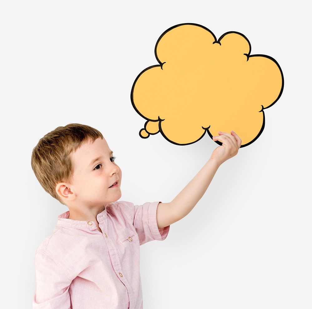 Cute boy holding a thought bubble paper cutout