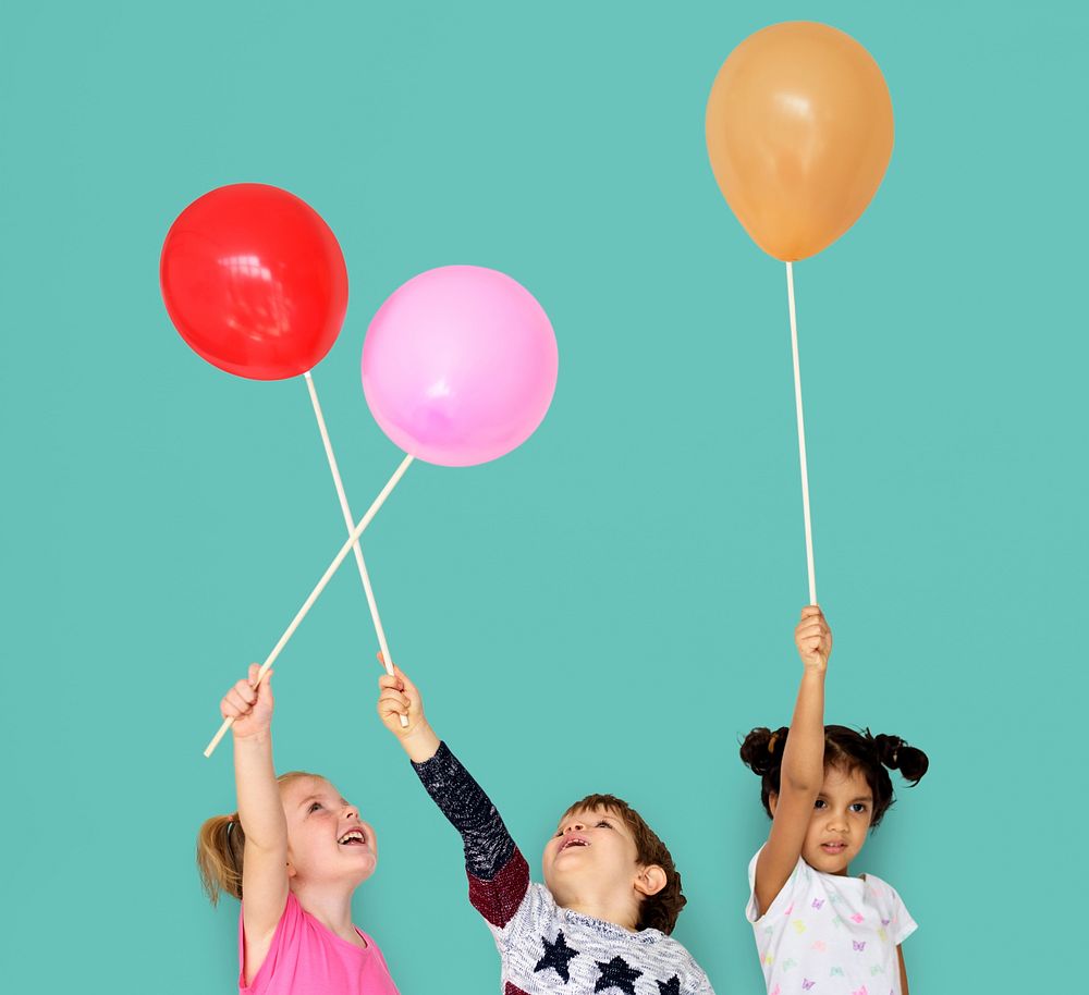 Little Children Playing Balloon Fun Smiling