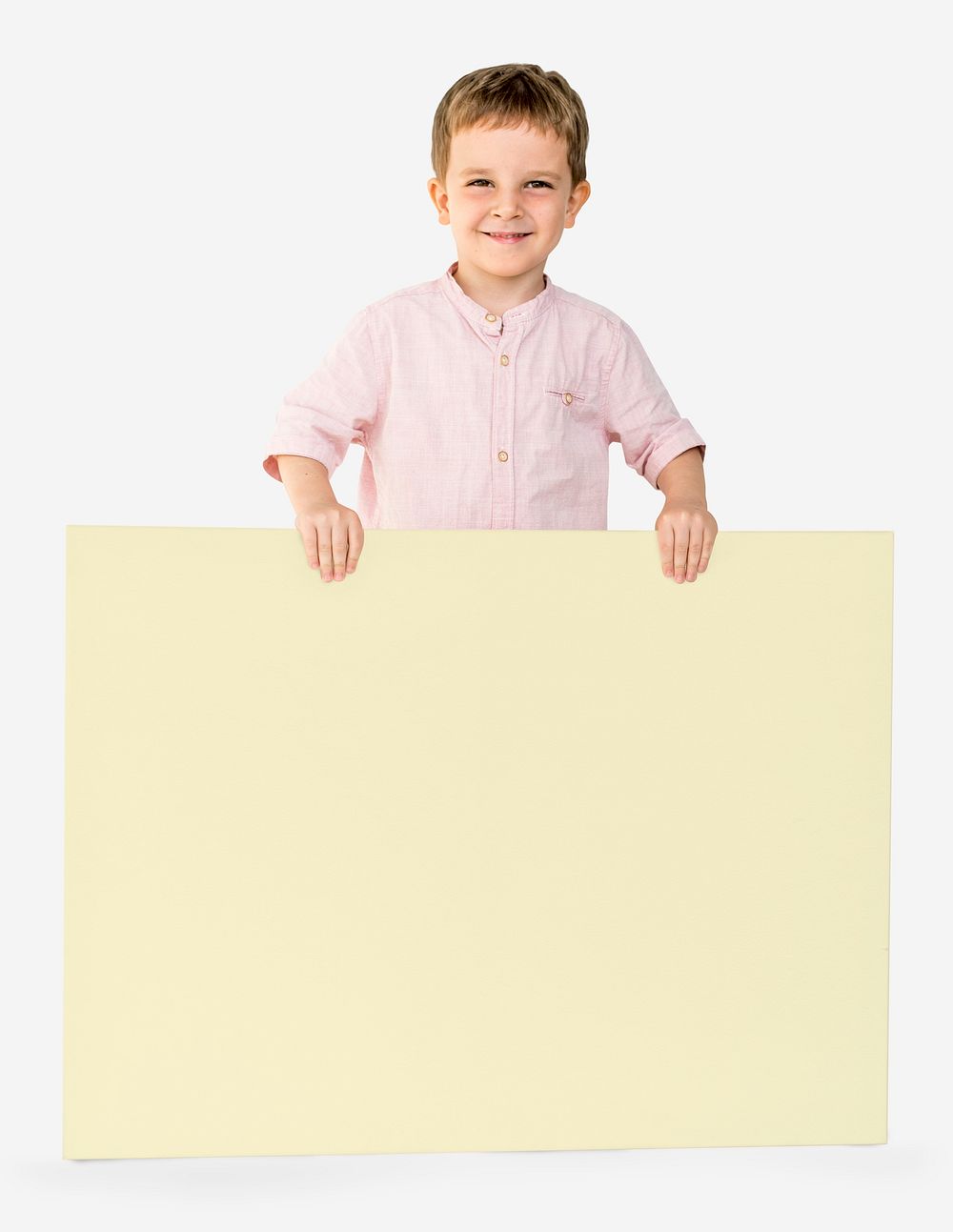 Little Boy Holding Empty Paper Smiling