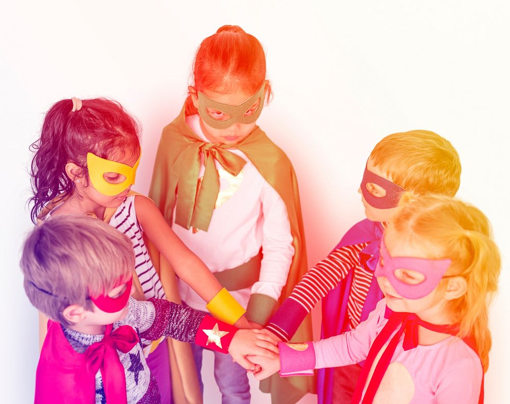 Superhero kids friends hands power support for teamwork