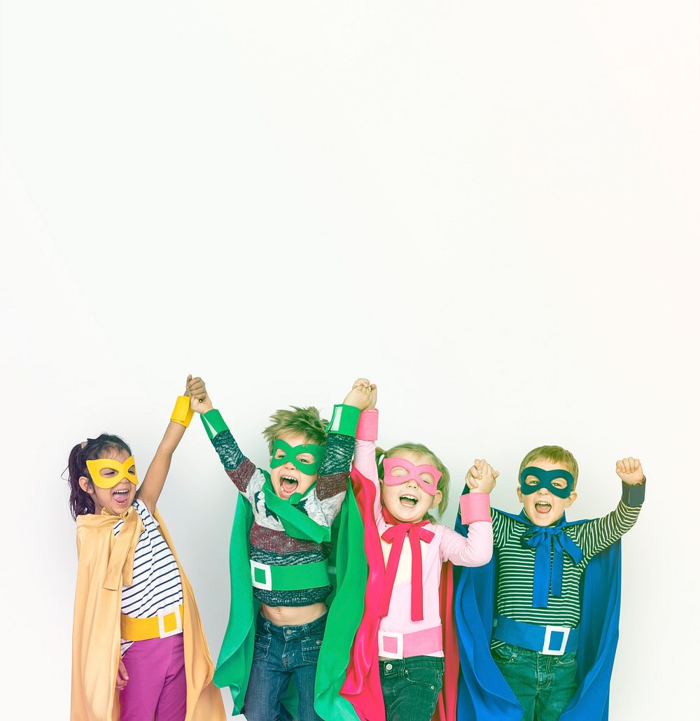 Group of kids wearing superhero costume for shoot