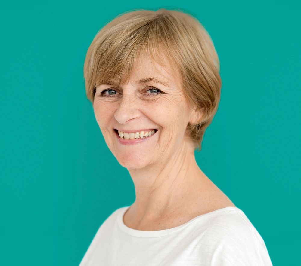 Senior Adult Woman Smiling Happiness Studio Portrait