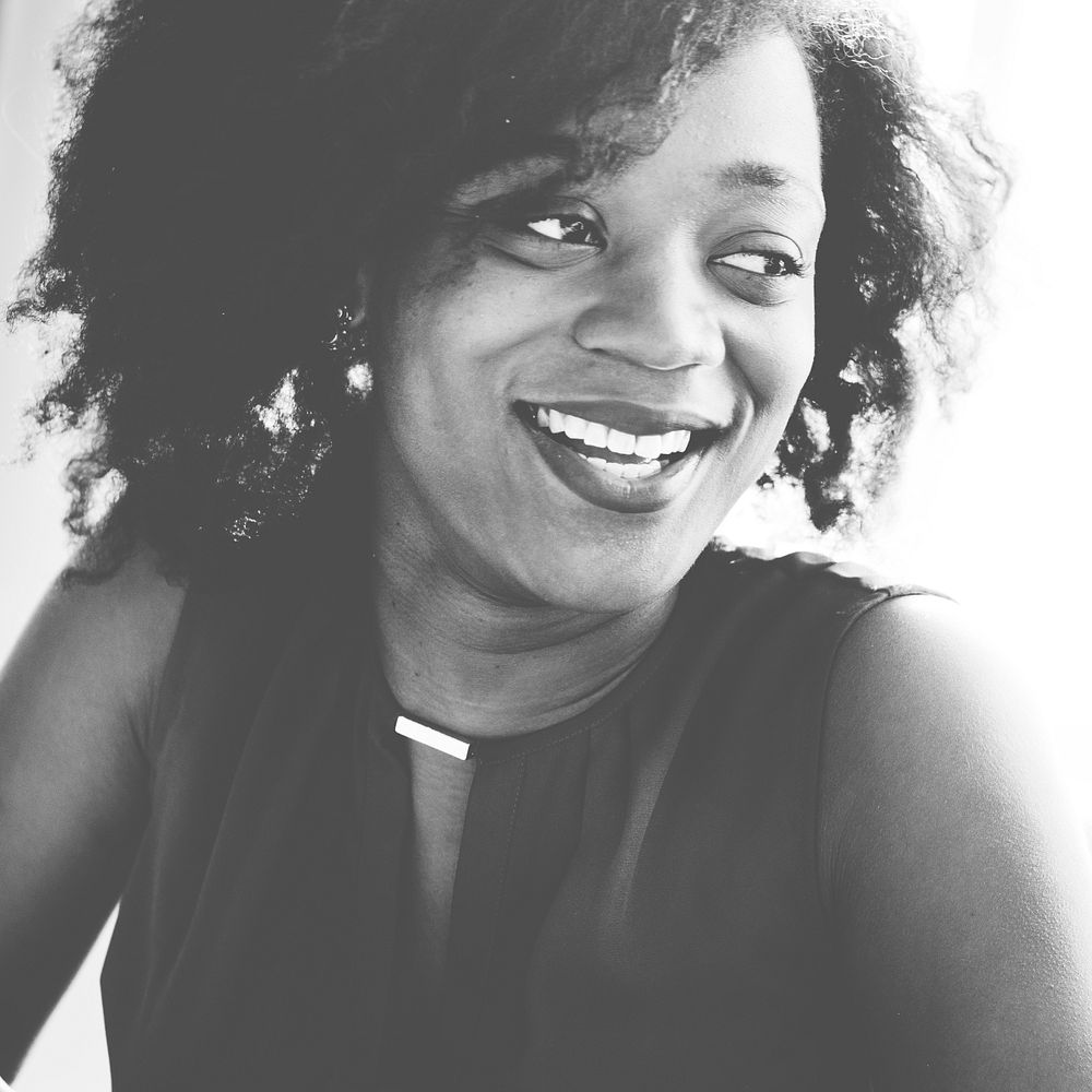 Black and white woman smiling