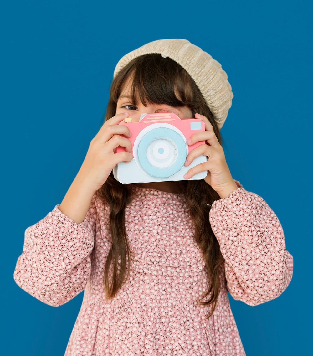 Little Girl Holding Papercraft Arts Camera Photogrphing Studio Portrait