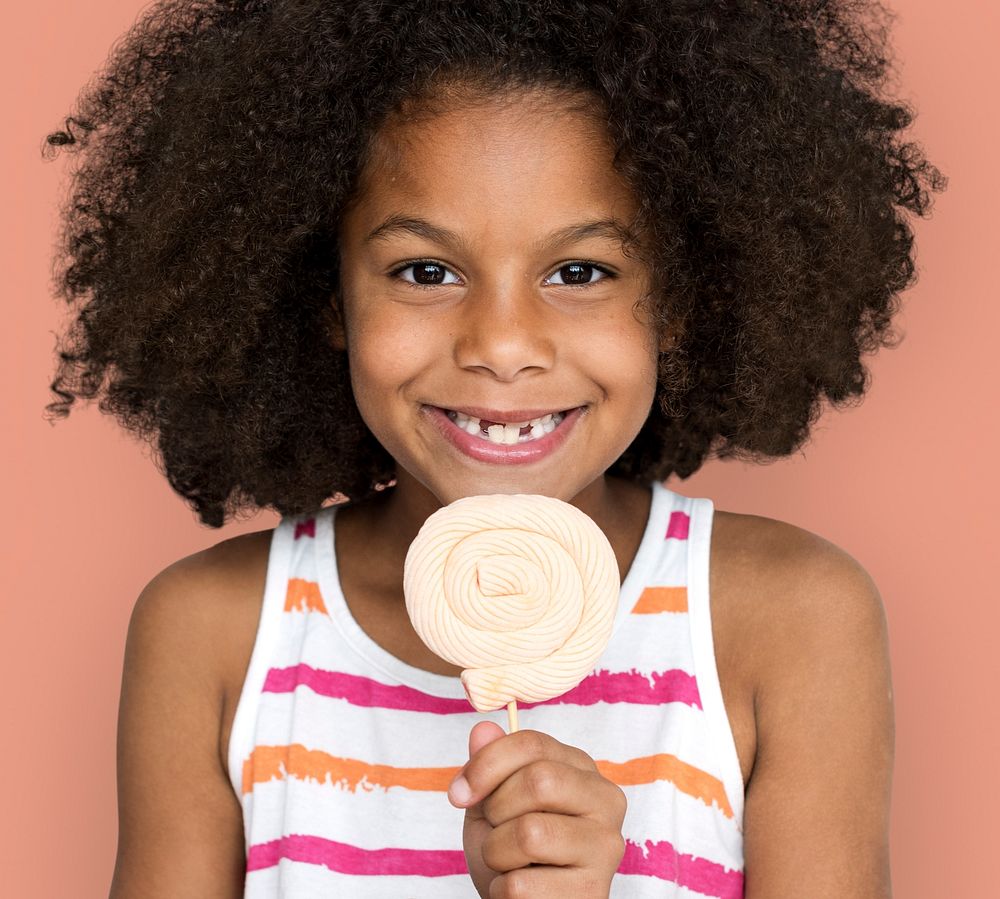 Little Girl Smiling Happiness Studio Portrait Sweet Lollipop
