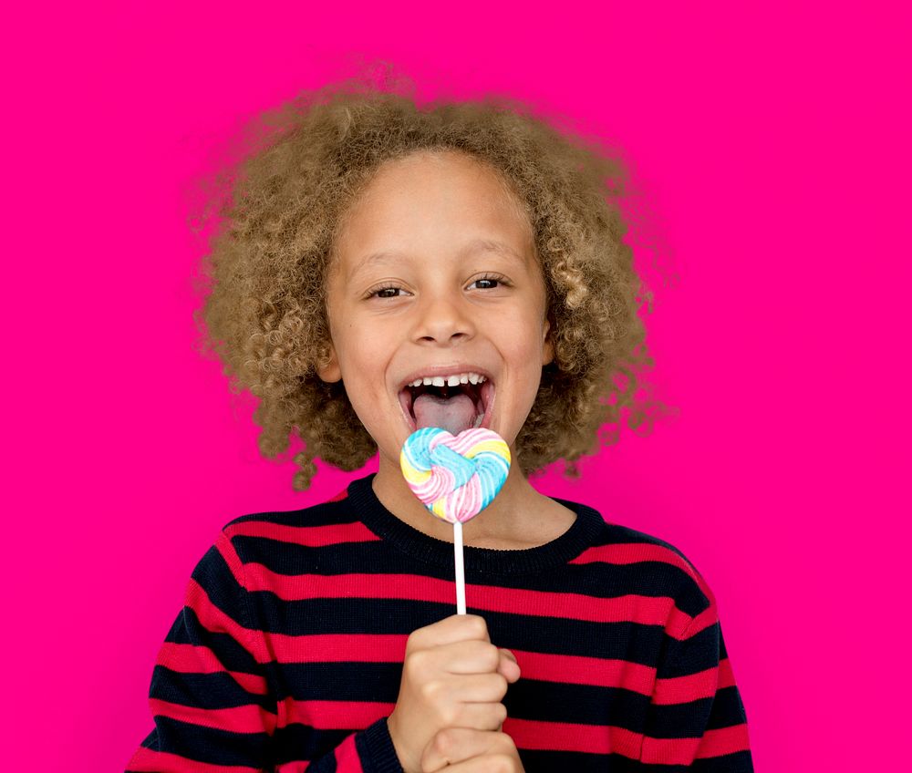 Little Boy Eating Lollipop Candy