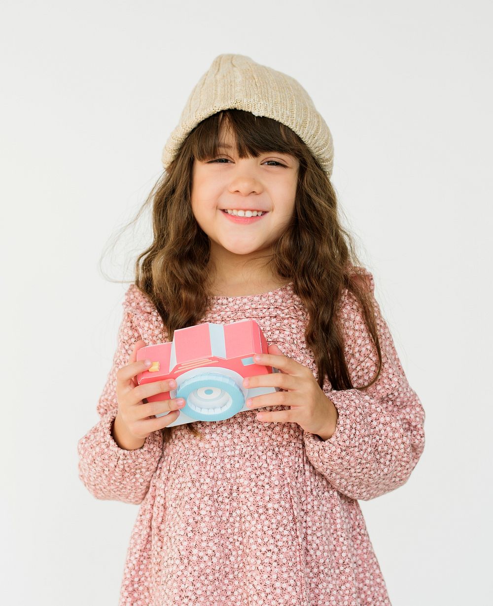 Little Girl Holding Papercraft Arts Camera Studio Portrait