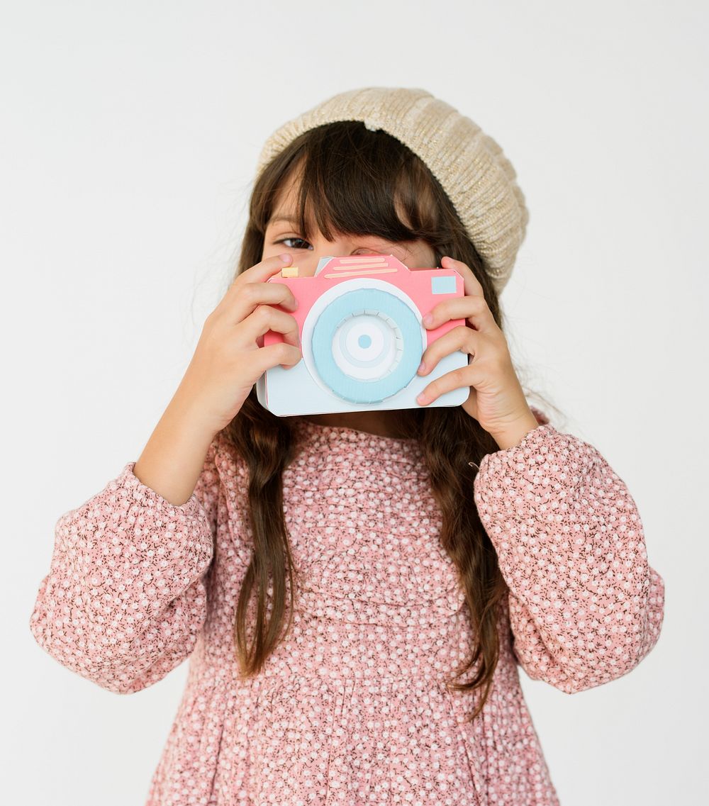 Little Girl Holding Papercraft Arts Camera Studio Portrait