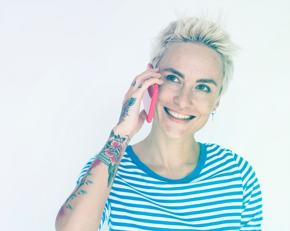 Caucasian woman talking mobile phone and smiling