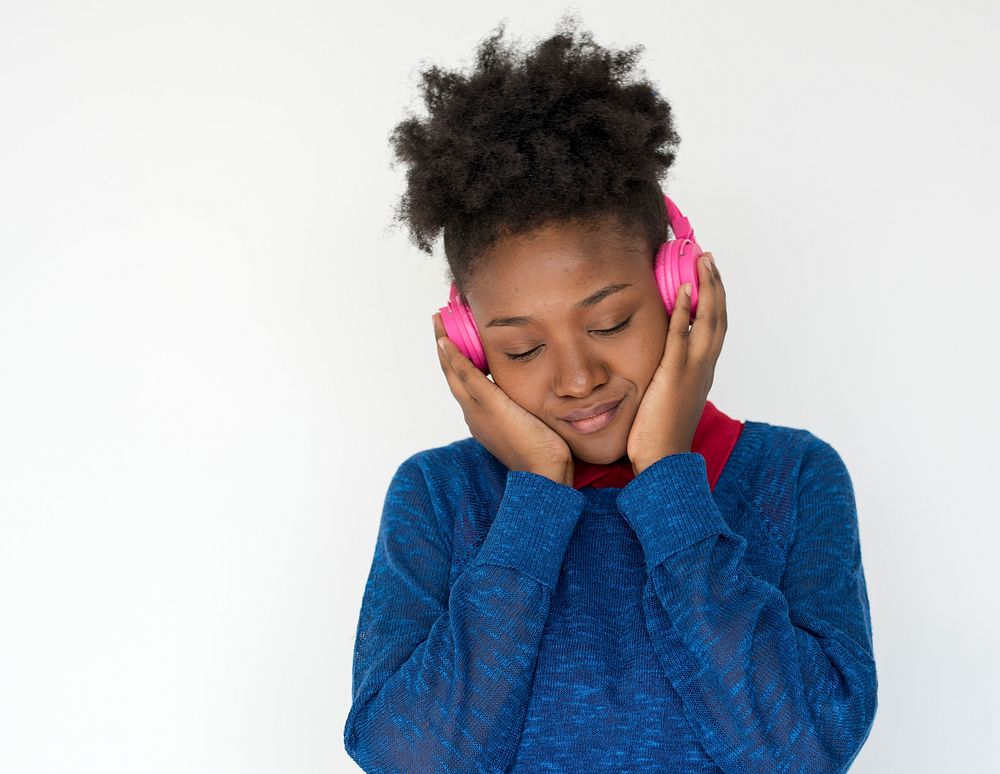 Portrait of a beautiful African girl with headphones
