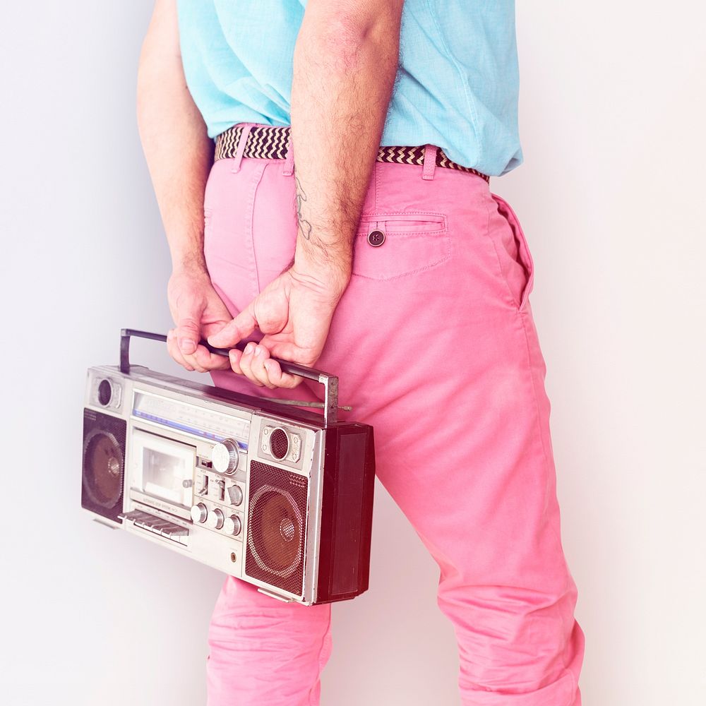 Crop photo of man colorful fashiion holding stereo