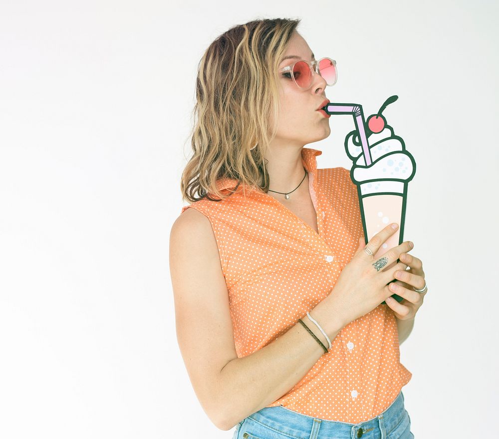 Woman holding papercraft drinking smoothies dessert