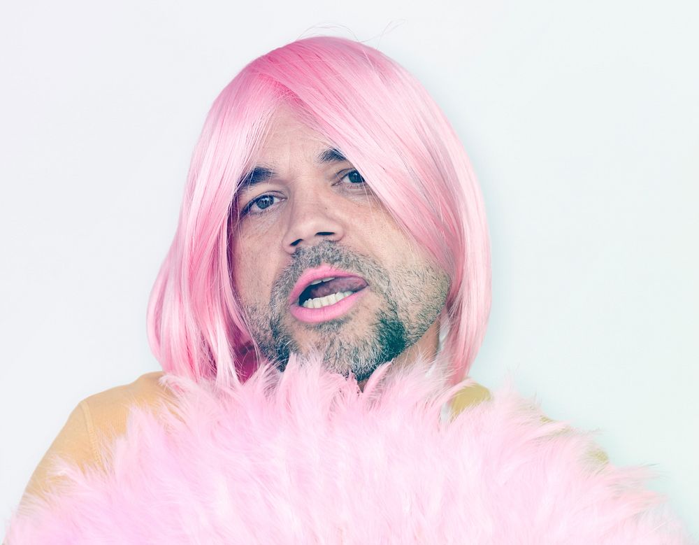A Man With Pink Wig and Pink Lipstick Staring