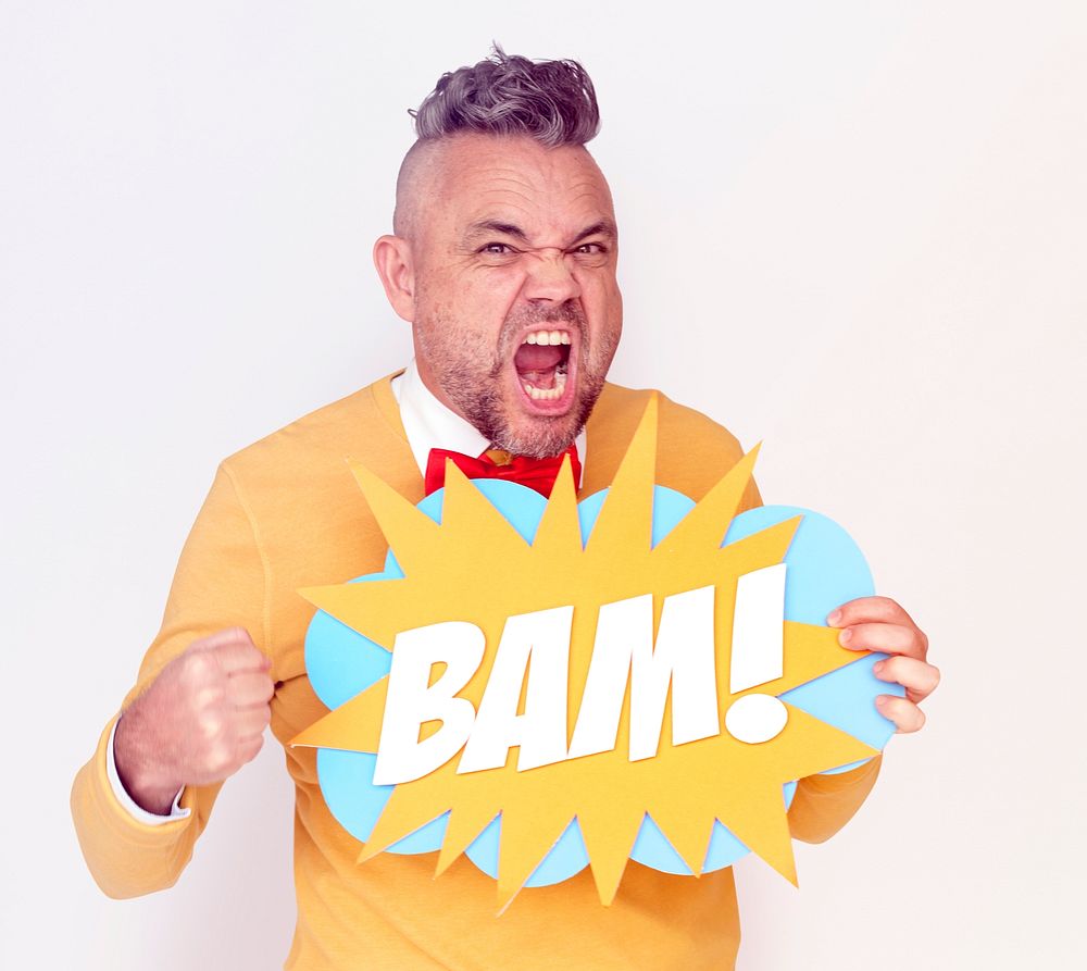 Man holding papercraft with bam word