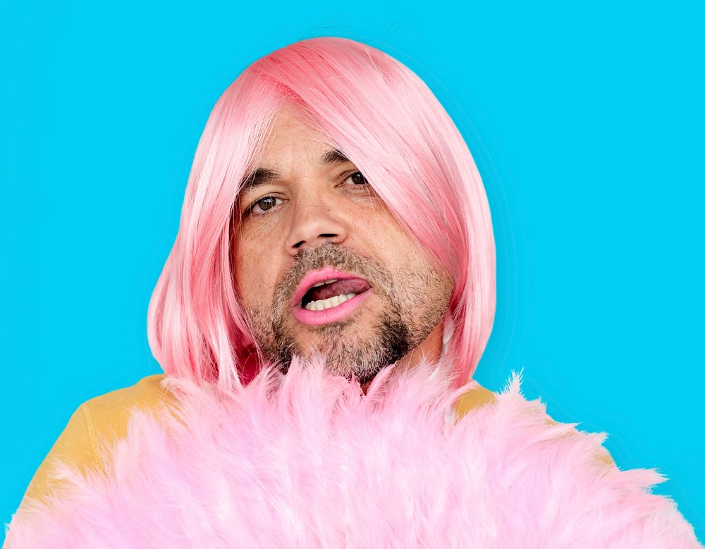 A Man With Pink Wig and Pink Lipstick Staring