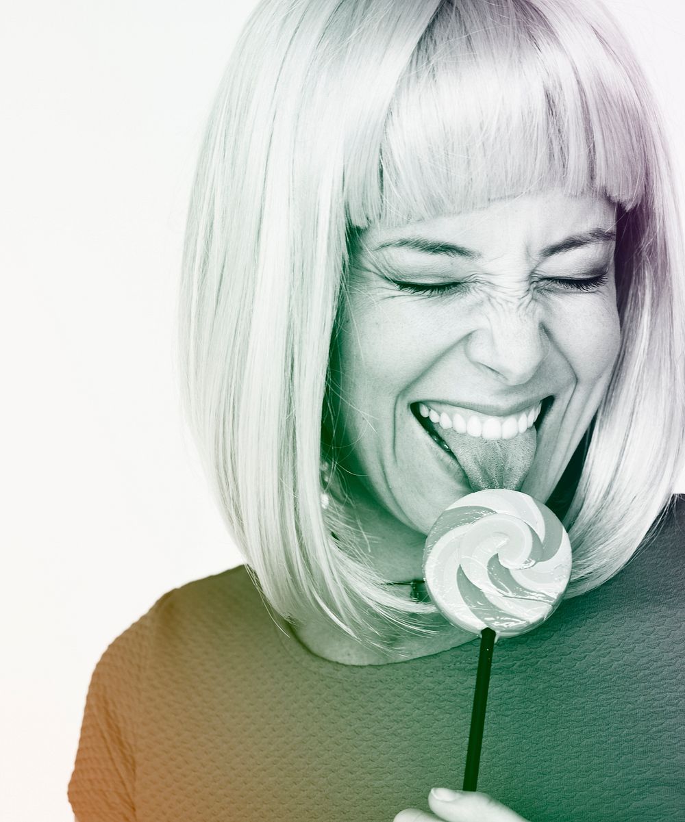 Woman licking a lollipop with feeling