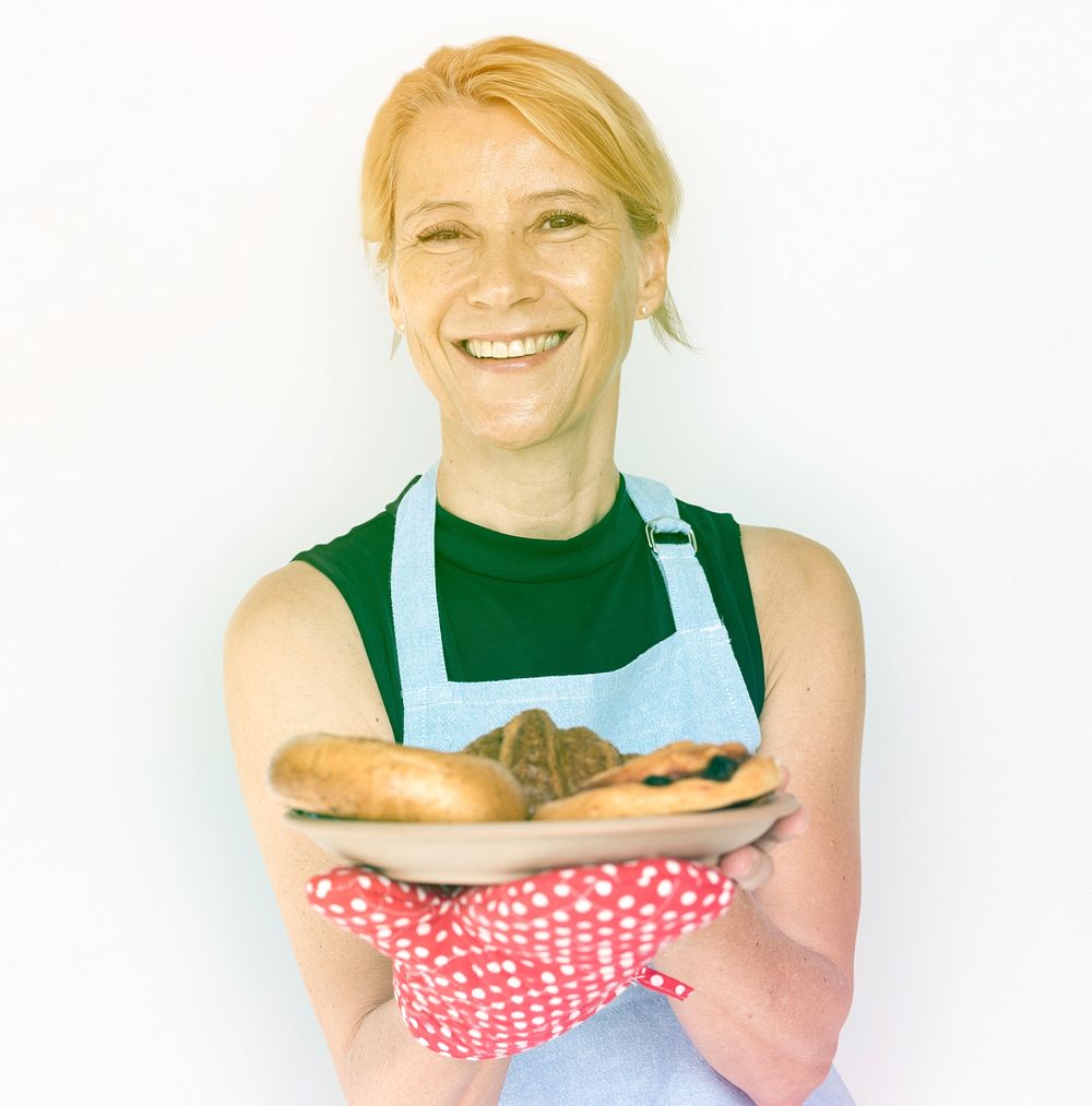 Blonde Woman Holding Bread Smiling