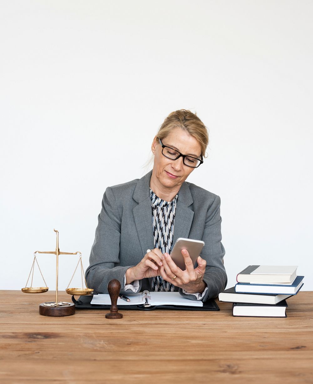 Woman Lawyer Using Mobile Phone